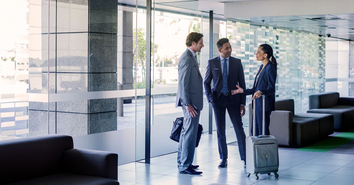Chauffeur greeting a corporate client